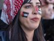 Devojka sa naslikanom palestinskom zastavom na obrazima protestuje u Španiji u znak podrške Palestincima