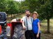 Vladan Simić i Jelena Topalović pored traktora na imanju u Feketiću gde gaje višnje